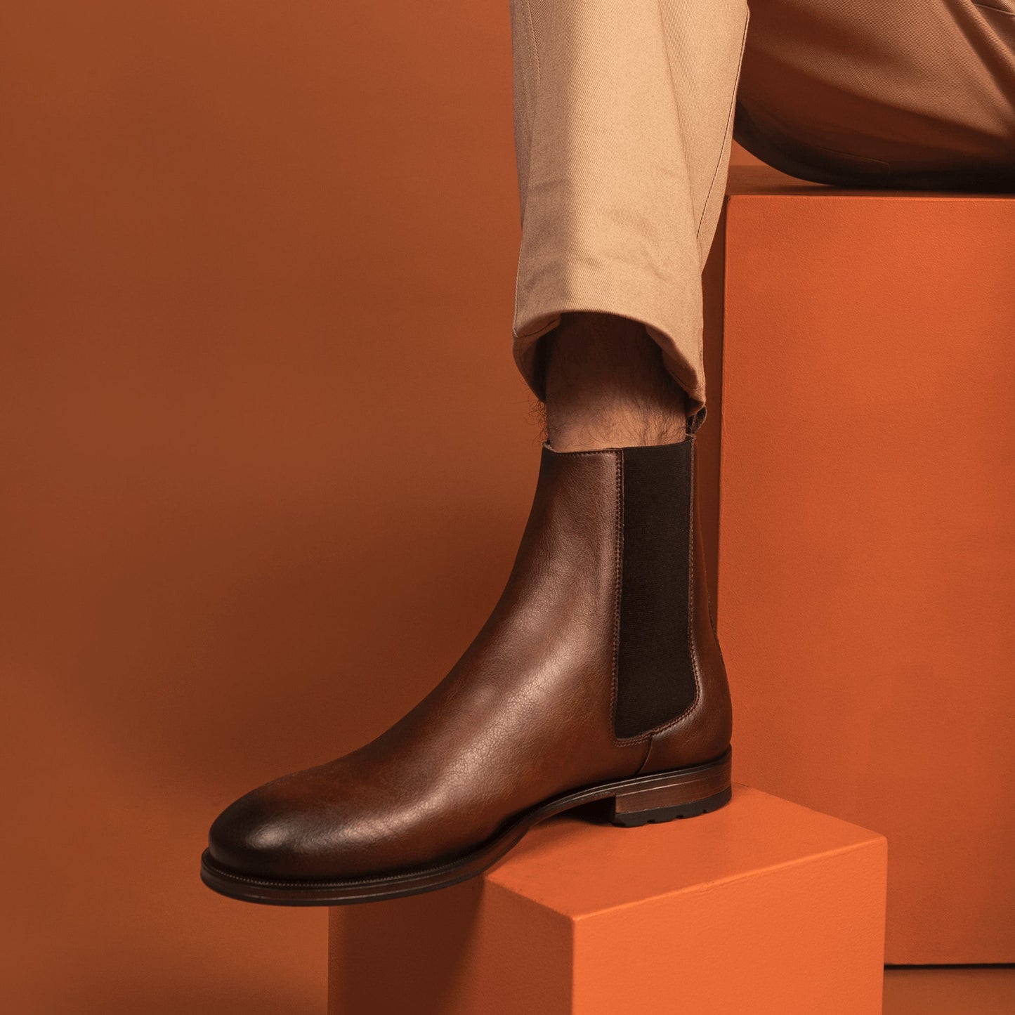 chelsea boot lifestyle with beige pants from NAE Vegan Shoes