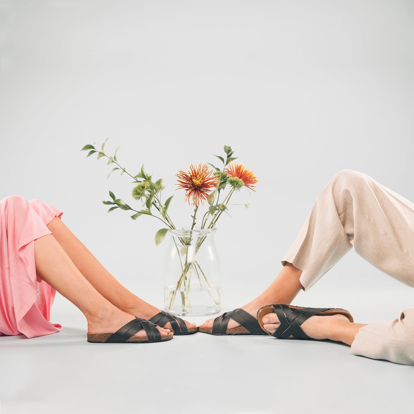 Unisex vegan flats with cushioned sole wearing dress and pants | NAE Footwear