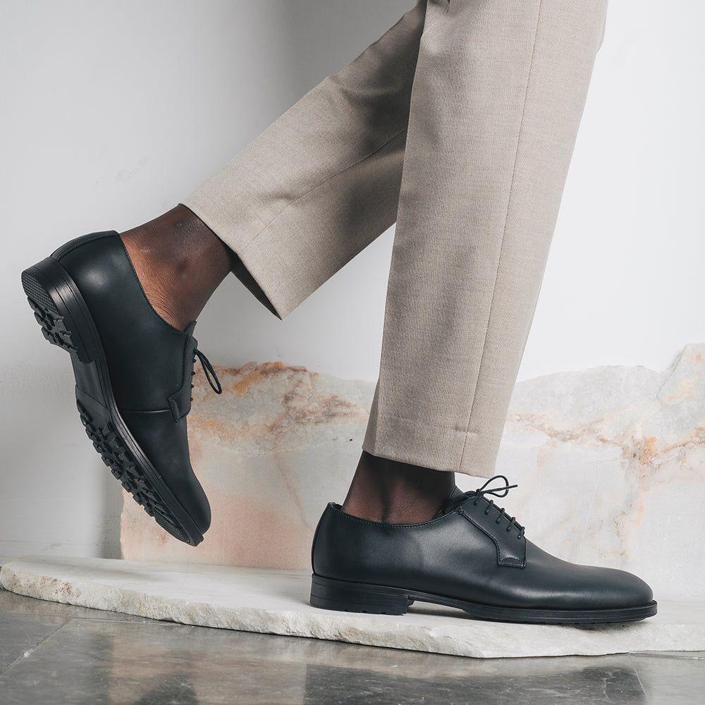 Men black blucher shoes crafted from vegan leather wearing pants | NAE Vegan Shoes