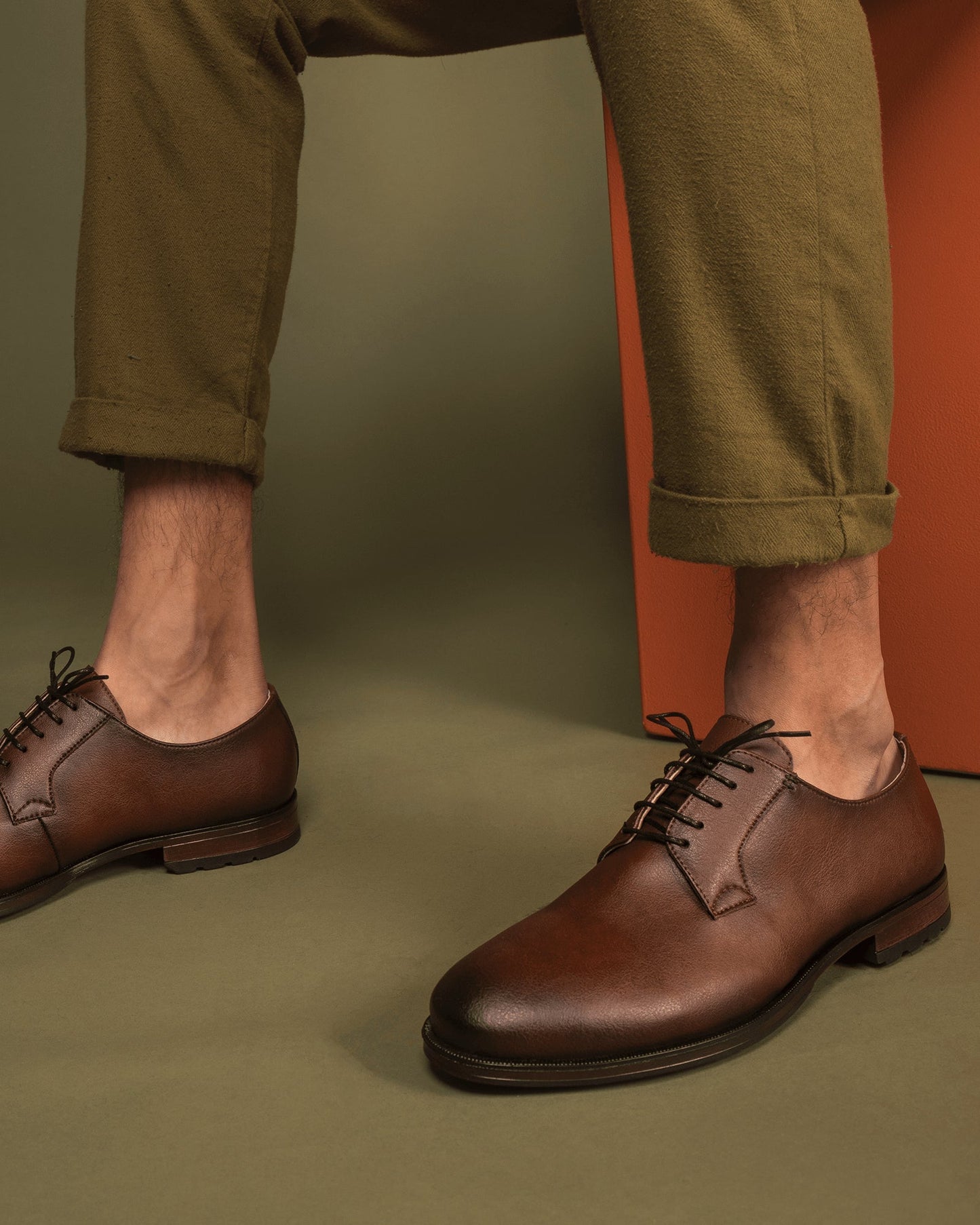 Men brown vegan shoes blucher made with sustainable microfibers wearing pants | NAE