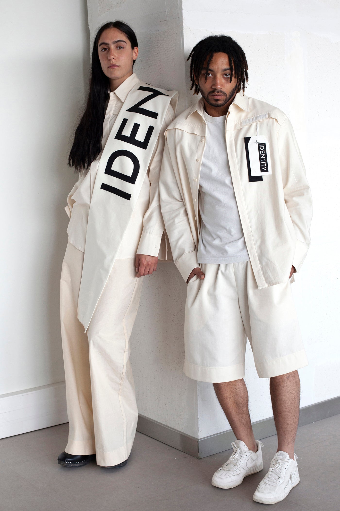 The White Canvas scarf in natural cotton color made from leftover deadstock fabrics and with black patched IDENTITY letters. Unique piece, made in France