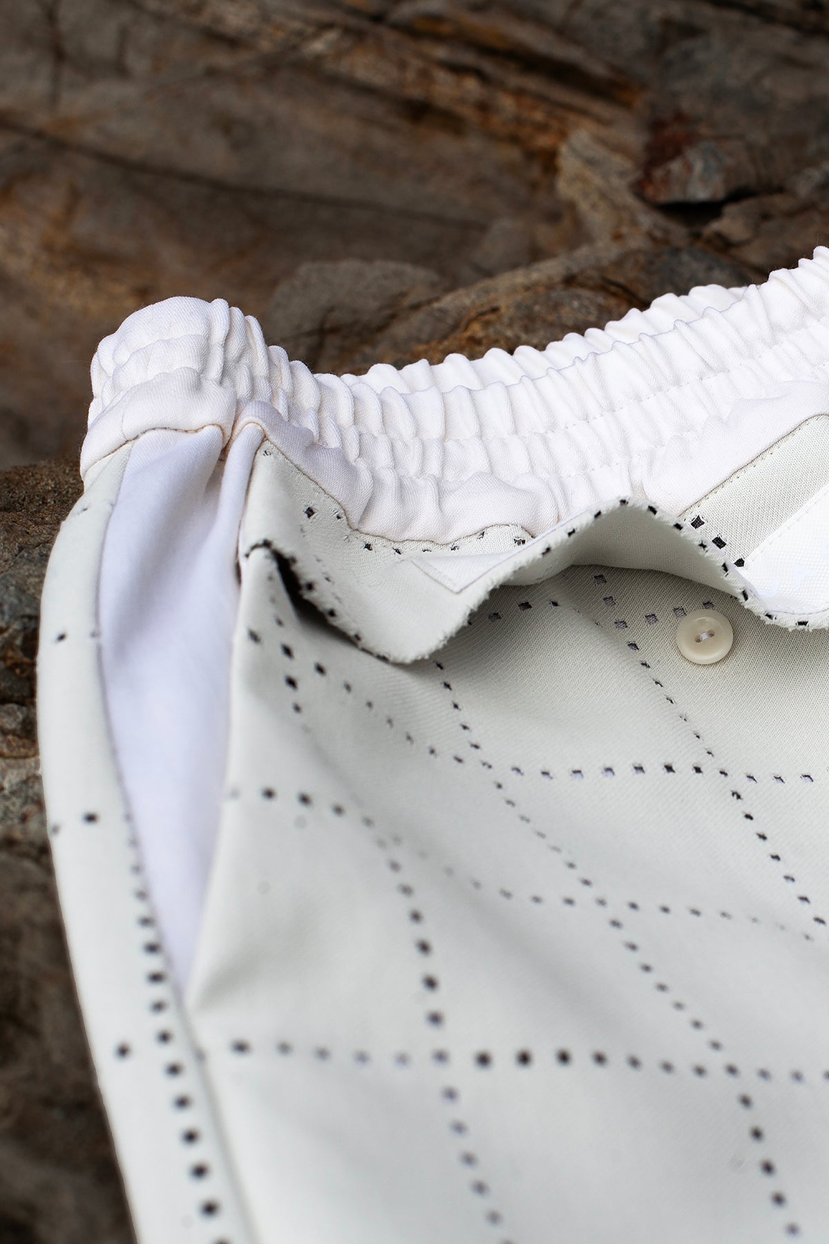 White Canvas sustainable light grey color, genderless, seasonless casual checks trousers, size S. The Essential checks trousers have minimal modern aesthetics design allowing comfort and bringing self-confidence. This unique piece is made locally in Paris to reduce environmental impact and guarantee high quality and durability of the products.