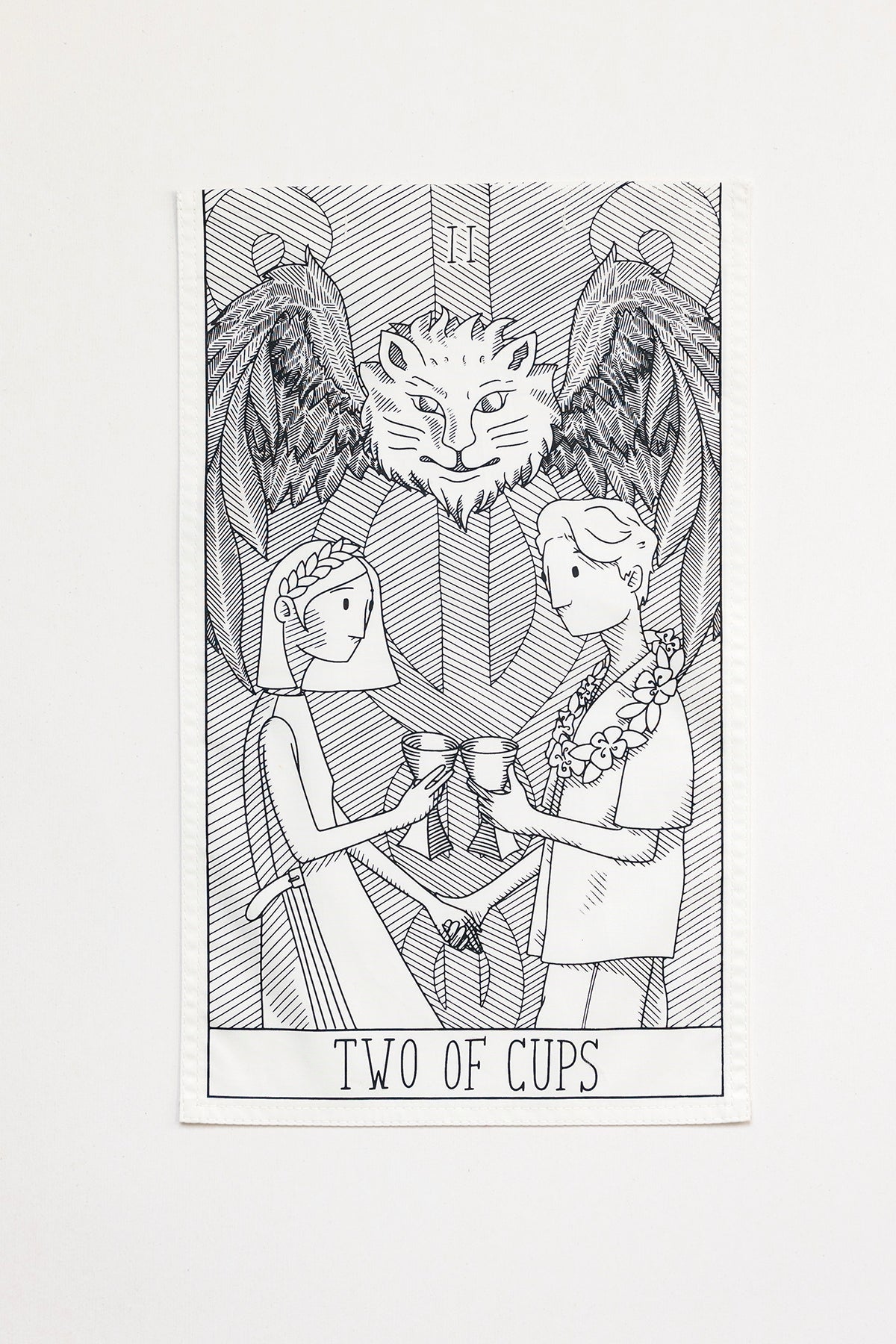 THE TWO OF CUPS vertical panel is made from leftover deadstock white cotton poplin. The panel has an exclusive design inspired by tarot cards drawn by the artist Maria Robla and printed with black artisanal eco-friendly ink locally in Paris in collaboration with RoStudio. Attach the black and white panel to the essential pieces to personalize them and wear them your unique way. Your perfect summer accessory.
