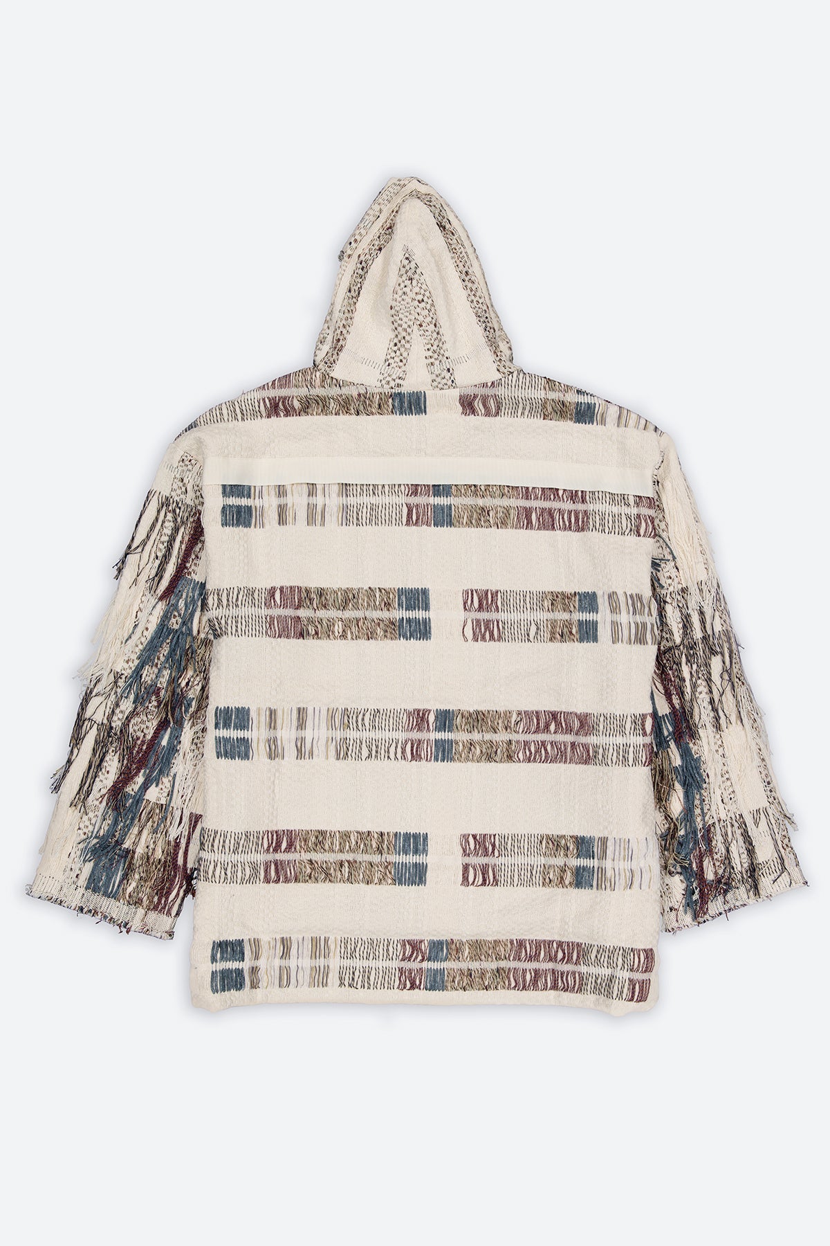 The artisanal fringe hoody is a mix of tweed fabrics from luxury houses deadstock. This unique piece is made locally in Paris to reduce environmental impact and guarantee high quality and durability of the products. It is gender neutral, has oversize fit and has a minimal impact on environment.