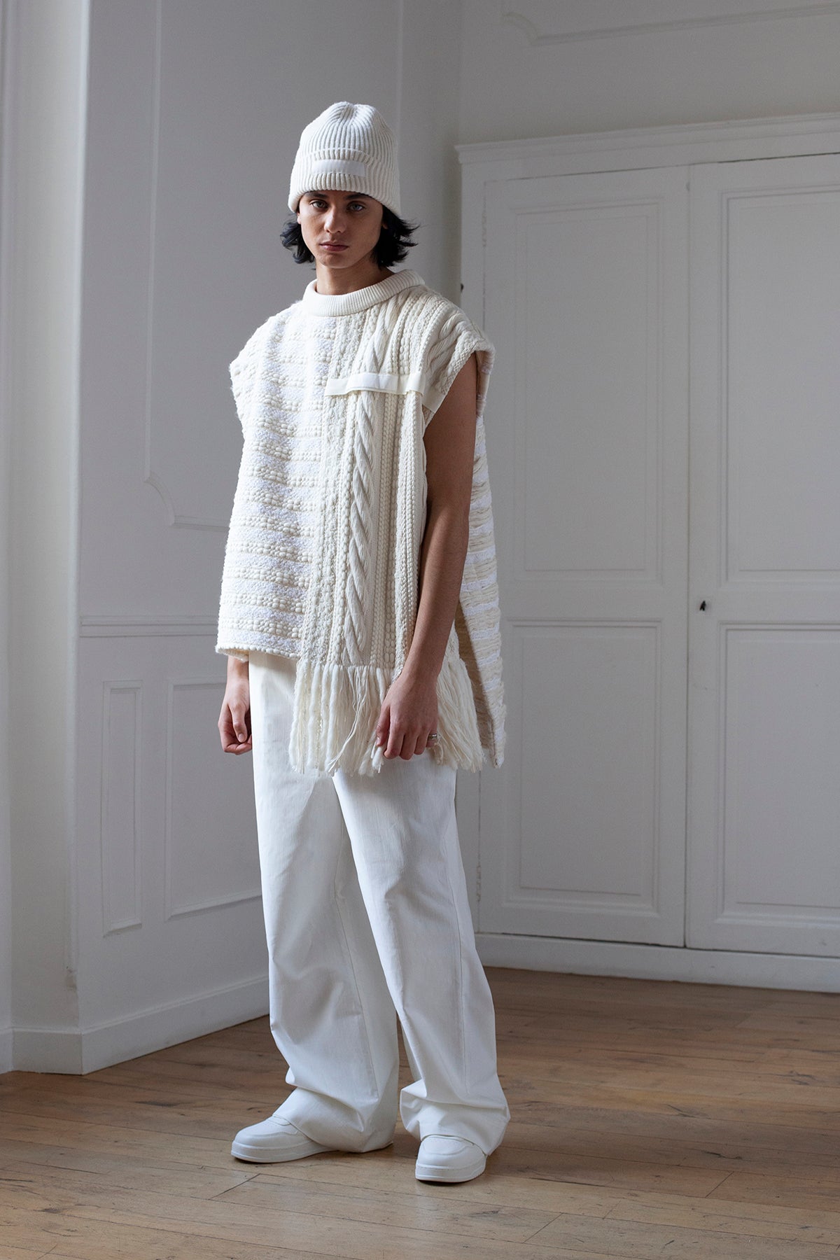 The artisanal sleeveless sweater is a mix of tweed fabrics from luxury houses deadstock. This unique piece is made locally in Paris to reduce environmental impact and guarantee high quality and durability of the products. It is gender neutral, has oversize fit and has a minimal impact on environment.