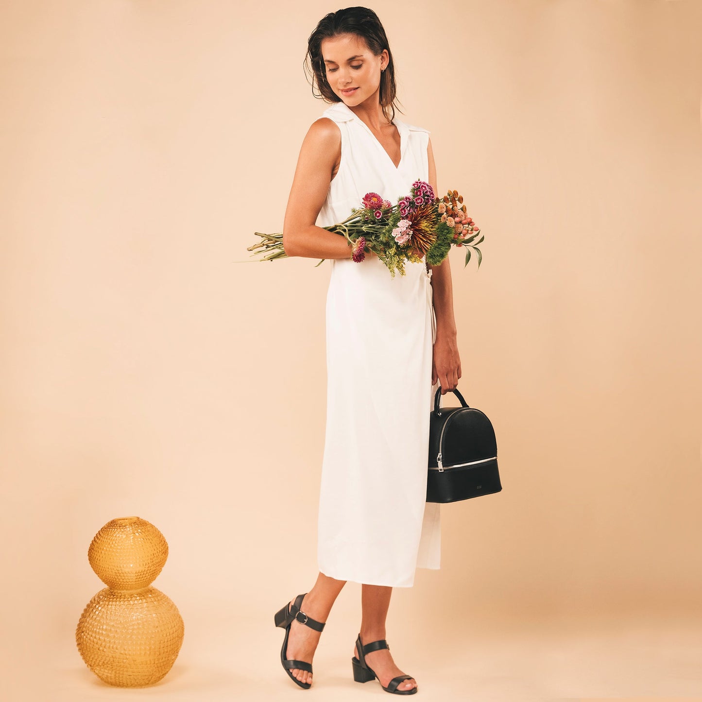 Women black vegan sandals heels wearing a white dress | NAE Vegan Shoes