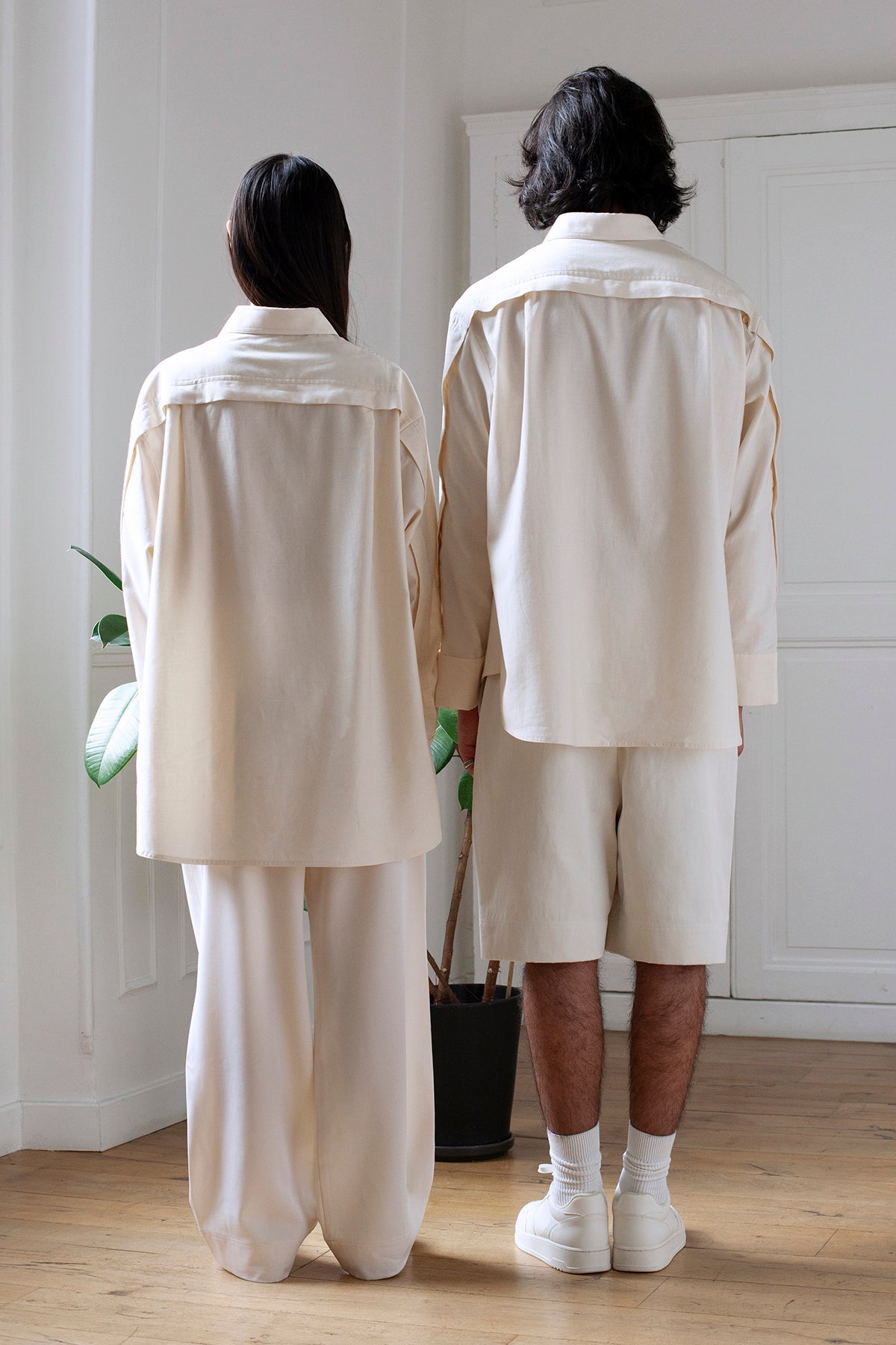 SiJia and Medhi are wearing White Canvas sustainable natural beige color, organic cotton oversized, genderless, inclusive, seasonless casual shirt