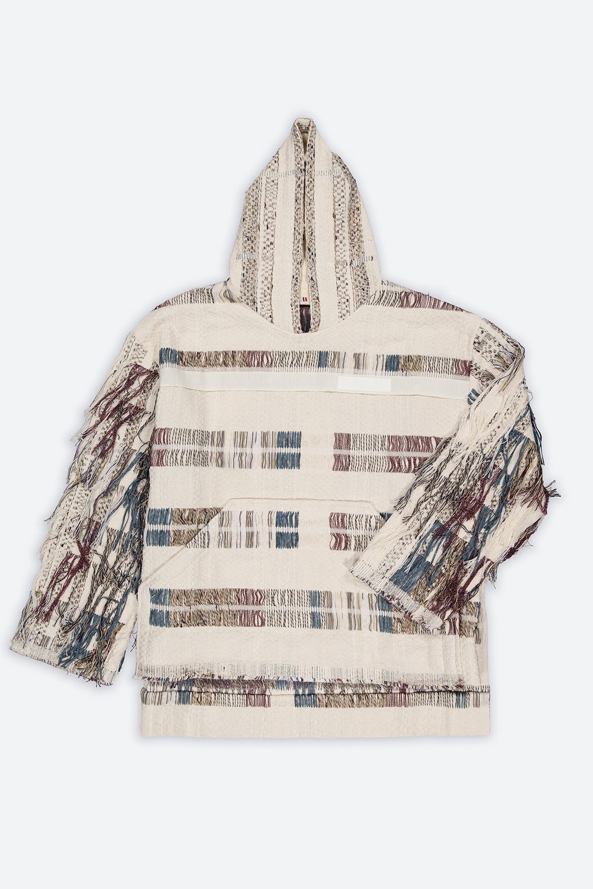 The artisanal fringe hoody is a mix of tweed fabrics from luxury houses deadstock. This unique piece is made locally in Paris to reduce environmental impact and guarantee high quality and durability of the products. It is gender neutral, has oversize fit and has a minimal impact on environment. 